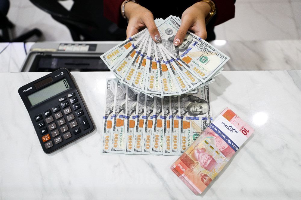 Rupiah Awal Pekan Dibuka Melemah ke Rp16.077, Dolar AS Perkasa