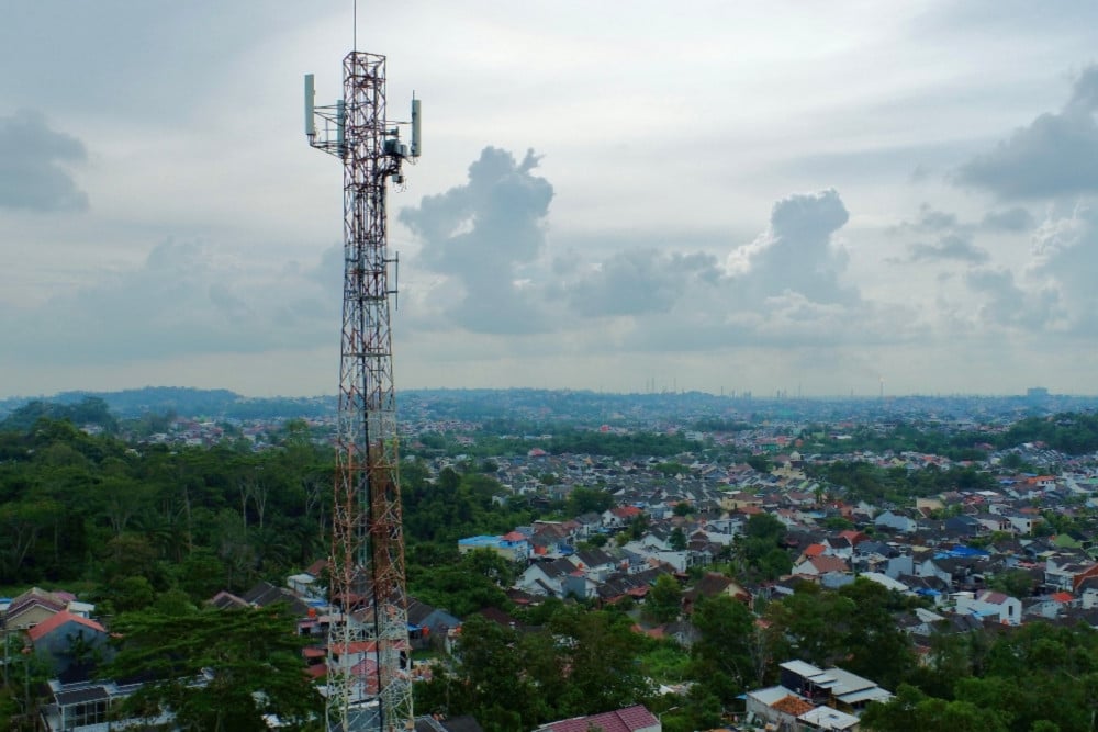 Masuk Era Suku Bunga Rendah, Potensi Cuan Emiten Telko & Menara Terbuka