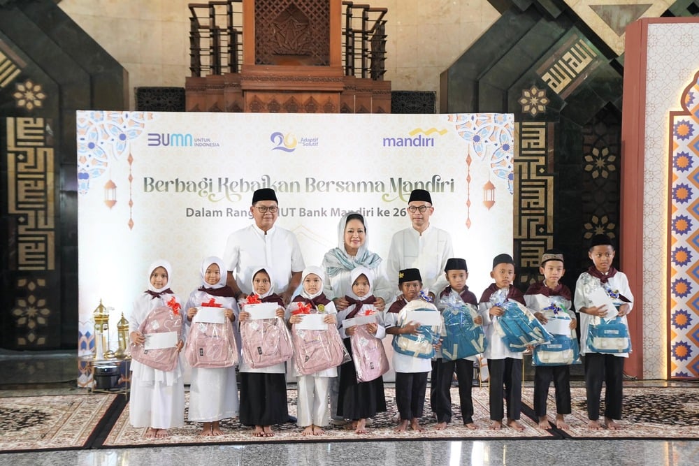 Rayakan Kehangatan HUT ke-26, Bank Mandiri Bagikan Santunan Pendidikan ke 2.600 Anak Yatim Piatu